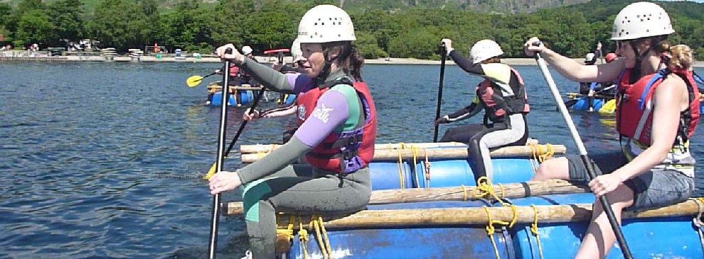 Hen party and stag party raft building in the sunny Lake District.
